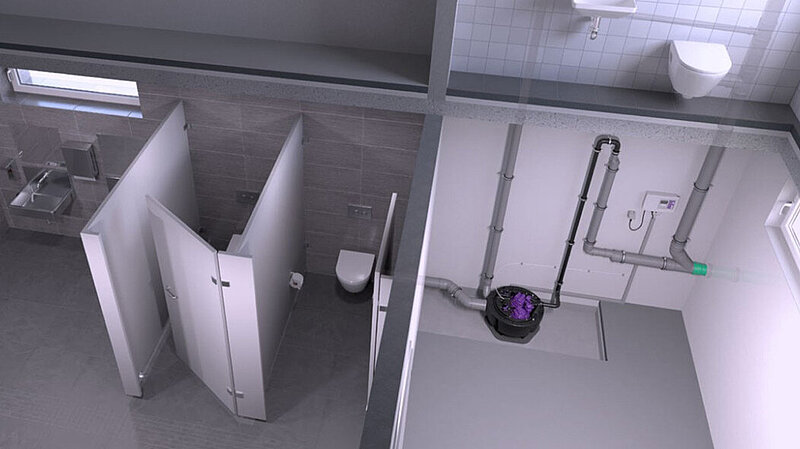 Voorbeeld van de installatie van een pompstation bij een openbaar toilet
